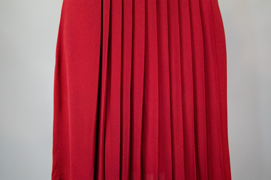 1940s Vintage Dress Pleated Skirt a close up photo of the pleats on a 1940s vintage dress